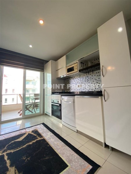 Атмосферная двухкомнатная квартира 50 м² в районе Оба, Аланья-id-3092-фото-2