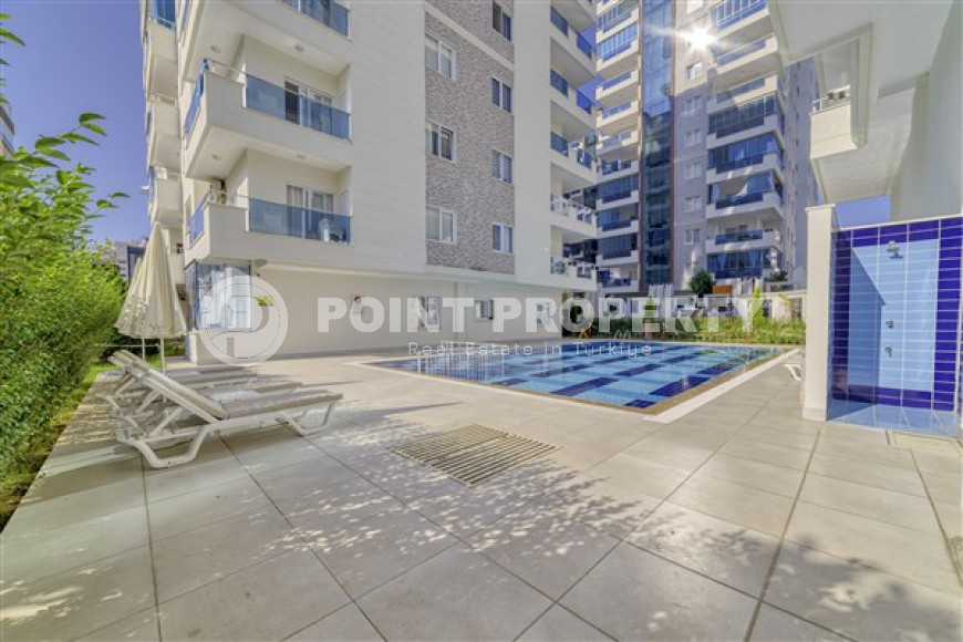 Luxurious three-room apartment 115 m² with furniture and a large balcony, Mahmutlar, Alanya-id-3093-photo-23