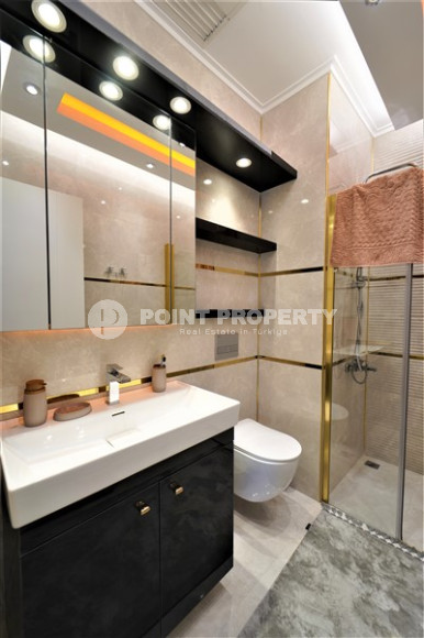 Luxurious apartment 130 m² in a new residence with a shopping complex, Mahmutlar, Alanya-id-3099-photo-3