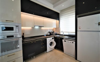 Luxurious apartment 130 m² in a new residence with a shopping complex, Mahmutlar, Alanya-id-3099-photo-11