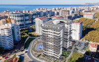 Новые апартаменты 1+1 на 10 этаже комплекса с большой территорией, Махмутлар, Аланья-id-3102-фото-12