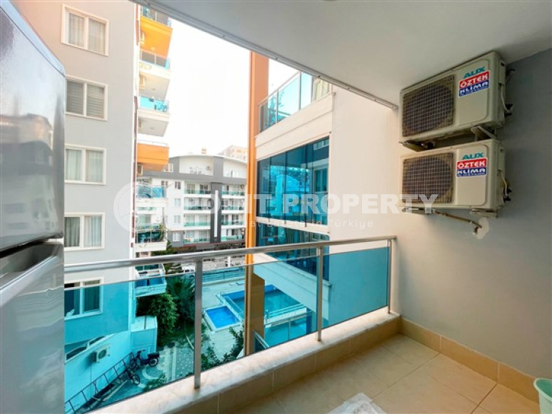 Очаровательная квартира с двумя спальнями в жилом комплексе городского типа, Тосмур, Аланья-id-3133-фото-17