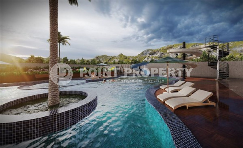 Симпатичные апартаменты 1+1 стандартной площади в новом доме Махмутлара, Аланья-id-3140-фото-11