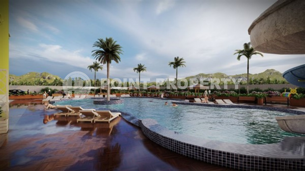 Симпатичные апартаменты 1+1 стандартной площади в новом доме Махмутлара, Аланья-id-3140-фото-12