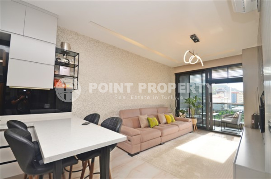 Роскошные двухкомнатные апартаменты в районе Каргыджак, Аланья, на первой береговой линии-id-3155-фото-2