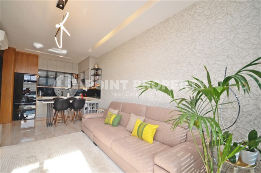 Роскошные двухкомнатные апартаменты в районе Каргыджак, Аланья, на первой береговой линии-id-3155-фото-3