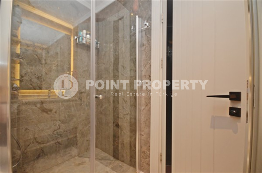 Роскошные двухкомнатные апартаменты в районе Каргыджак, Аланья, на первой береговой линии-id-3155-фото-7