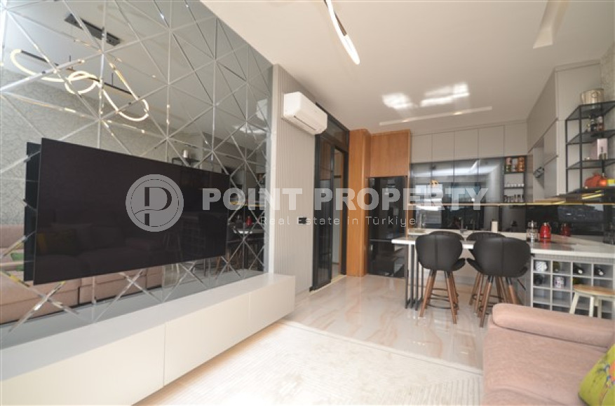 Роскошные двухкомнатные апартаменты в районе Каргыджак, Аланья, на первой береговой линии-id-3155-фото-9