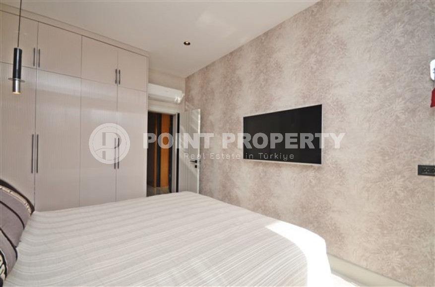 Роскошные двухкомнатные апартаменты в районе Каргыджак, Аланья, на первой береговой линии-id-3155-фото-11