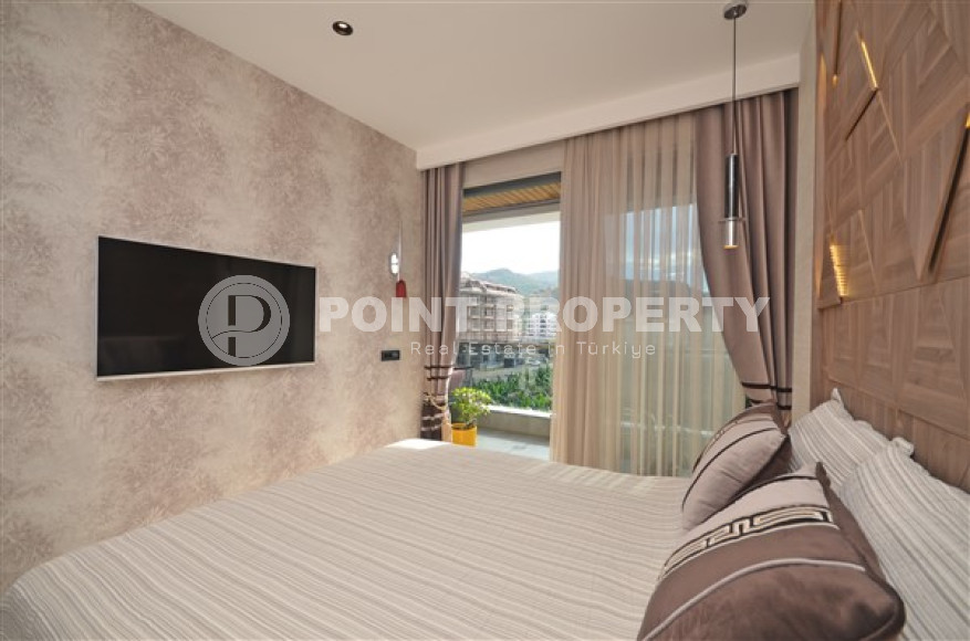 Роскошные двухкомнатные апартаменты в районе Каргыджак, Аланья, на первой береговой линии-id-3155-фото-12