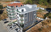 New 2+1 apartment in a building in 2022, upper Oba Alanya district, with two bathrooms-id-3173-photo-1