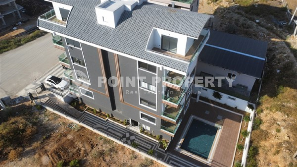 New 2+1 apartment in a building in 2022, upper Oba Alanya district, with two bathrooms-id-3173-photo-2
