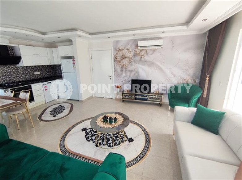 Two-room apartment 65 m² overlooking the ruins of an ancient castle in Mahmutlar, Alanya-id-3192-photo-3
