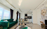 Two-room apartment 65 m² overlooking the ruins of an ancient castle in Mahmutlar, Alanya-id-3192-photo-6