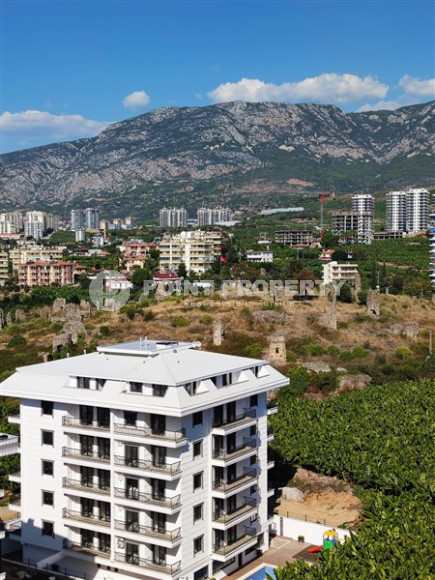 Two-room apartment 65 m² overlooking the ruins of an ancient castle in Mahmutlar, Alanya-id-3192-photo-10