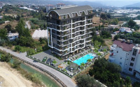Duplexes with roof access and 1+1 apartments in a new project in Avsallar, Alanya-id-3199-photo-1