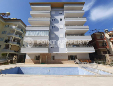 Прелестная трёхкомнатная квартира на 1 этаже комплекса городского типа, Джикджилли, Аланья-id-3205-фото-2