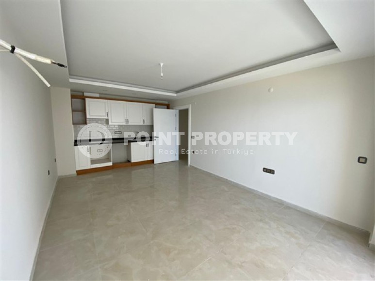 View apartment 2+1 in a house on the first coastline, Mahmutlar, Alanya-id-3206-photo-3