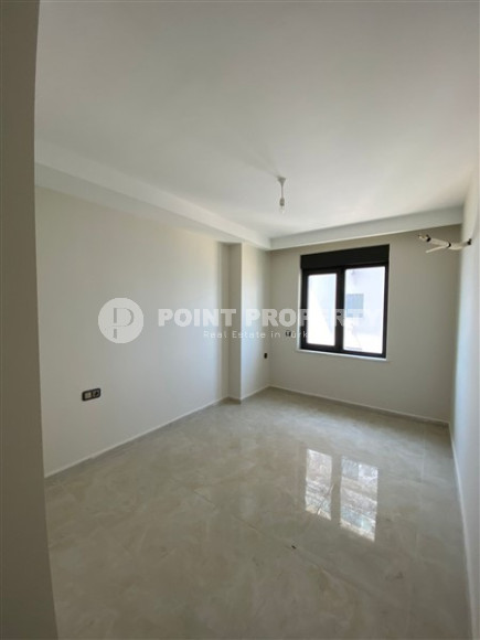 View apartment 2+1 in a house on the first coastline, Mahmutlar, Alanya-id-3206-photo-8