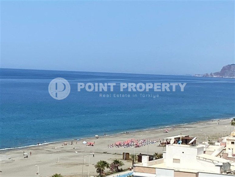 View apartment 2+1 in a house on the first coastline, Mahmutlar, Alanya-id-3206-photo-9