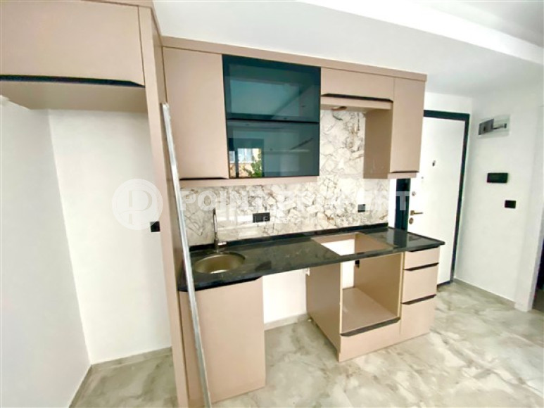 Compact 1+1 apartment in a new building with a swimming pool, Oba, Alanya-id-3208-photo-8
