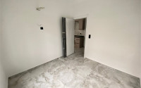 Compact 1+1 apartment in a new building with a swimming pool, Oba, Alanya-id-3208-photo-10