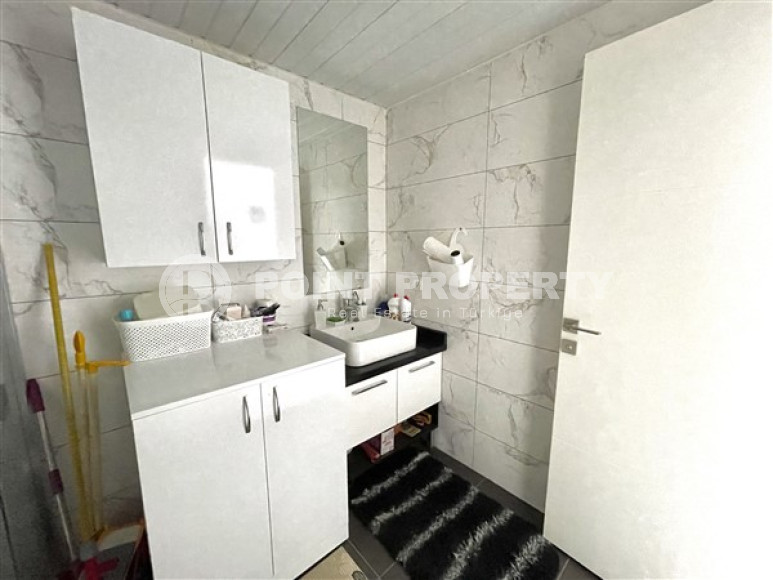 Классические апартаменты 1+1 в высотном здании района Махмутлар, Аланья-id-3217-фото-4