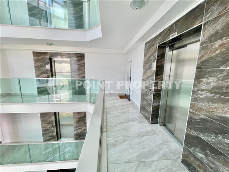 Классические апартаменты 1+1 в высотном здании района Махмутлар, Аланья-id-3217-фото-6