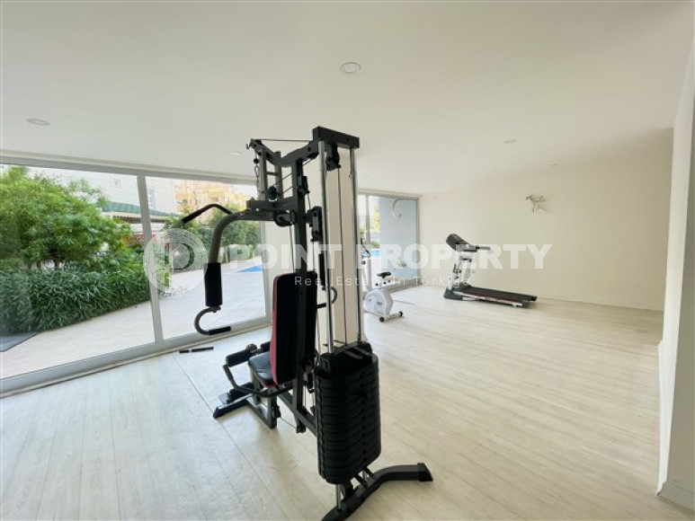 Классические апартаменты 1+1 в высотном здании района Махмутлар, Аланья-id-3217-фото-7