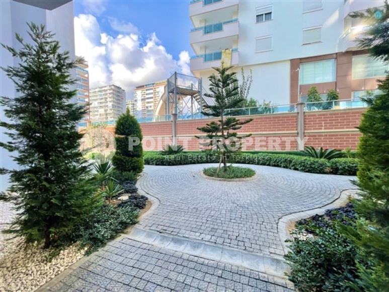 Классические апартаменты 1+1 в высотном здании района Махмутлар, Аланья-id-3217-фото-8