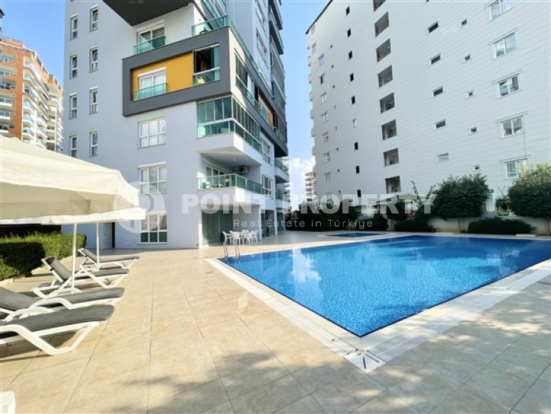 Классические апартаменты 1+1 в высотном здании района Махмутлар, Аланья-id-3217-фото-9