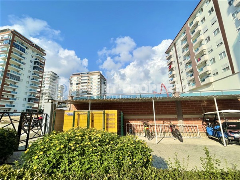 Классические апартаменты 1+1 в высотном здании района Махмутлар, Аланья-id-3217-фото-10