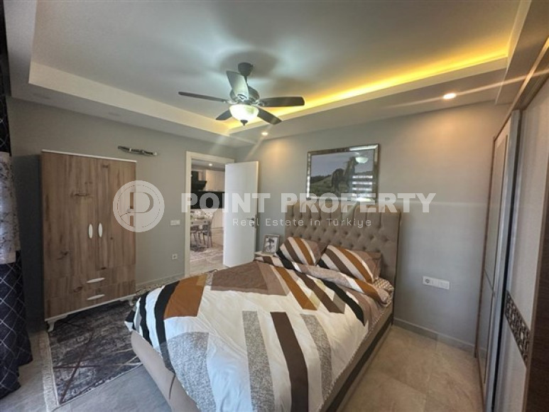 Классические апартаменты 1+1 в высотном здании района Махмутлар, Аланья-id-3217-фото-12