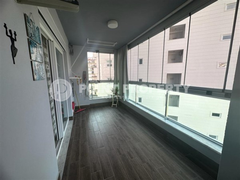 Классические апартаменты 1+1 в высотном здании района Махмутлар, Аланья-id-3217-фото-13