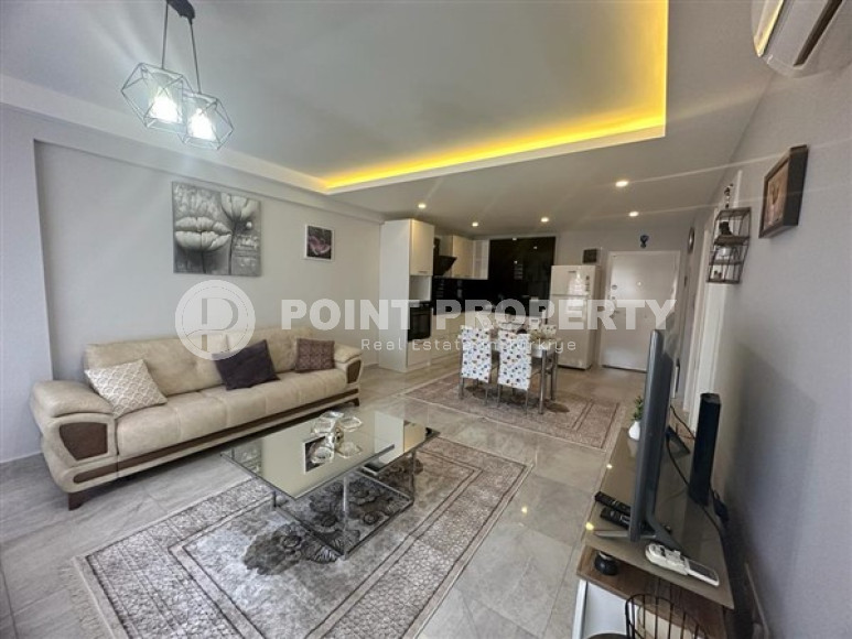 Классические апартаменты 1+1 в высотном здании района Махмутлар, Аланья-id-3217-фото-16