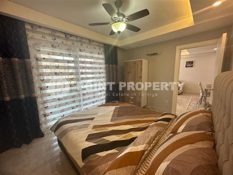 Классические апартаменты 1+1 в высотном здании района Махмутлар, Аланья-id-3217-фото-18