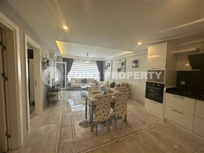 Классические апартаменты 1+1 в высотном здании района Махмутлар, Аланья-id-3217-фото-19