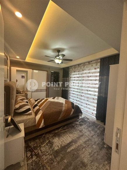 Классические апартаменты 1+1 в высотном здании района Махмутлар, Аланья-id-3217-фото-21