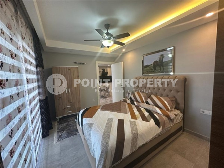 Классические апартаменты 1+1 в высотном здании района Махмутлар, Аланья-id-3217-фото-23