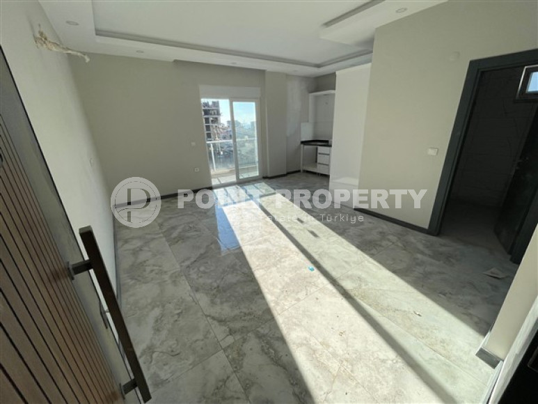 Inexpensive apartment 61 m2 in a new complex, Avsallar, Alanya, unfurnished-id-3230-photo-2