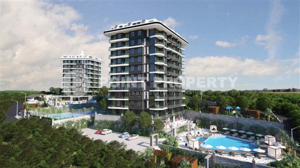 Апартаменты с двумя комнатами в строящемся комплексе в районе Демирташ, Аланья, площадью 55 м2-id-3232-фото-7