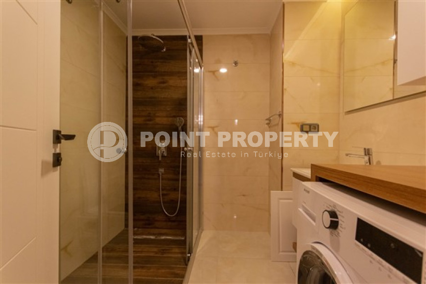 Стильная квартира с двумя спальнями в жилом комплексе на первой линии, Махмутлар, Аланья-id-3245-фото-10