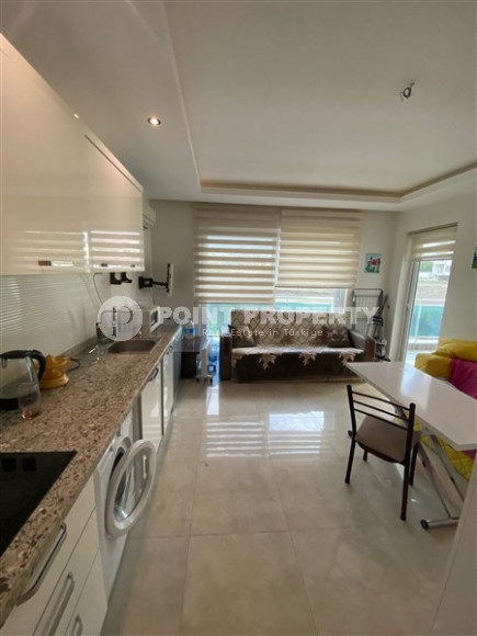Furnished studio apartment in a residential complex with varied infrastructure, Mahmutlar, Alanya-id-3246-photo-2