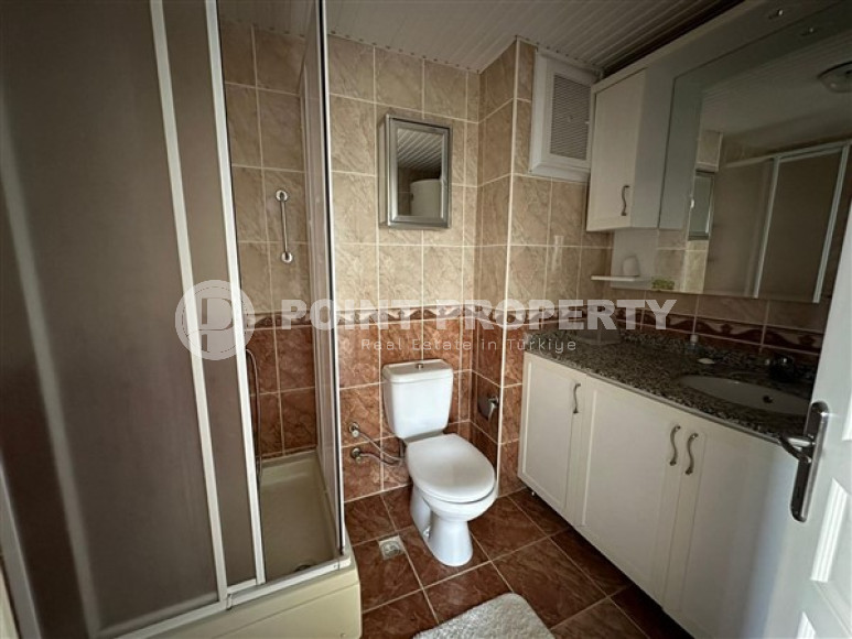 Небольшая квартира с площадью 55 м2 в пятистах метрах от моря, район Тосмур, Аланья-id-3250-фото-12