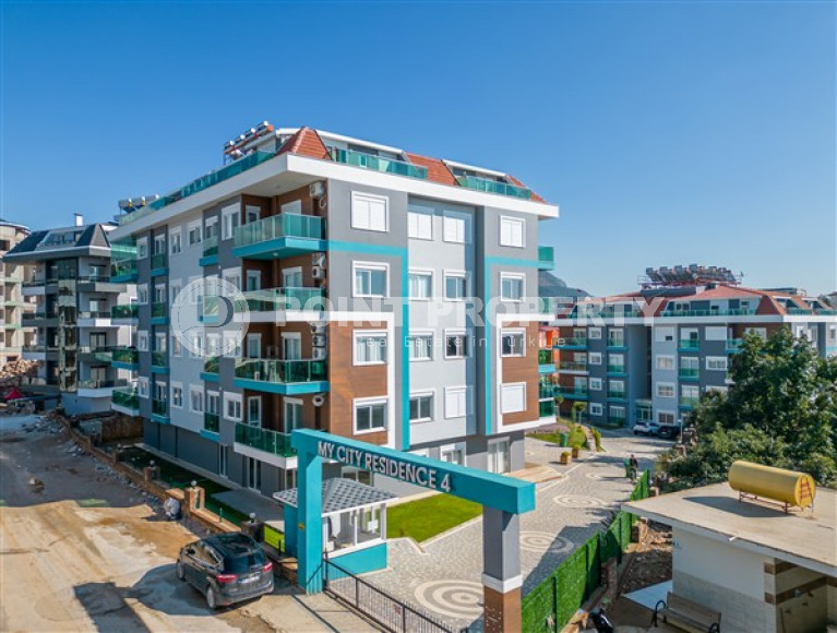 Апартаменты 1+1 с площадью 55 м2 в новом комплексе 2022 года, район Оба, Аланья-id-3257-фото-2