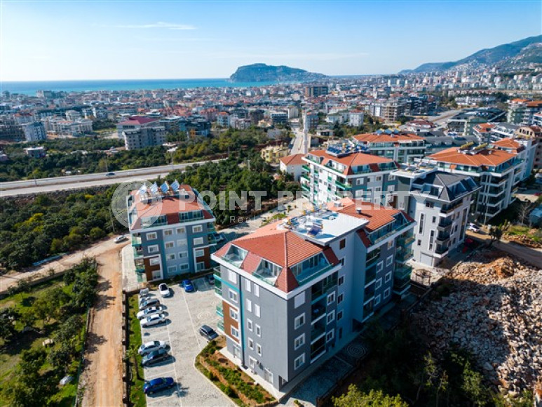 Апартаменты 1+1 с площадью 55 м2 в новом комплексе 2022 года, район Оба, Аланья-id-3257-фото-5