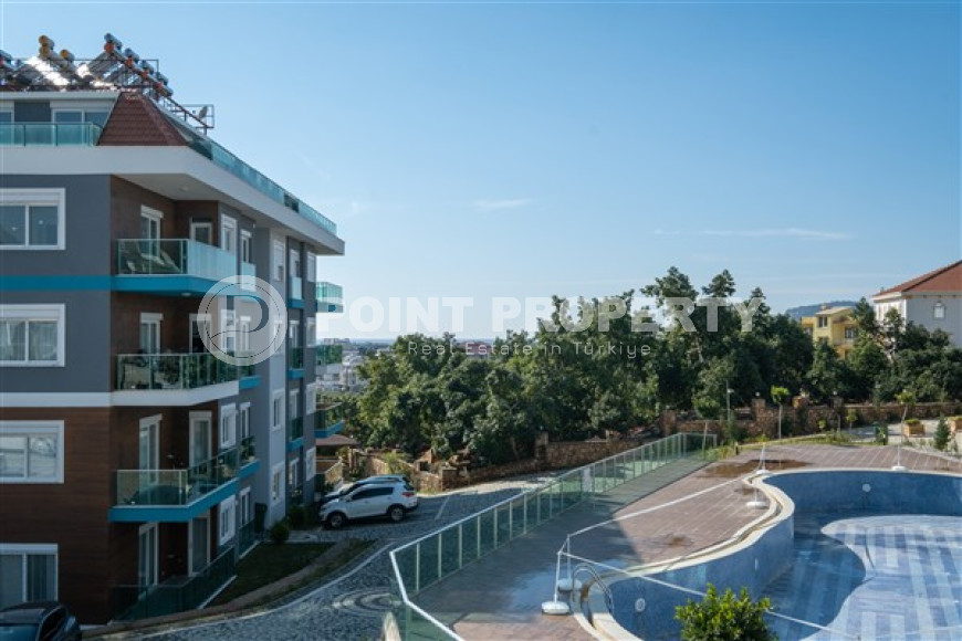 Апартаменты 1+1 с площадью 55 м2 в новом комплексе 2022 года, район Оба, Аланья-id-3257-фото-14