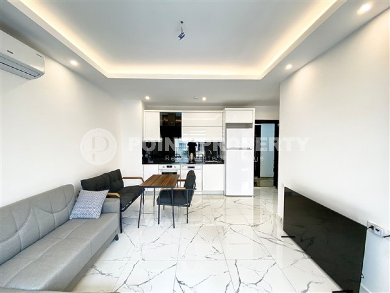 Удобные апартаменты 1+1 стандартной площади 57 м² в центре Аланьи, район Сарай-id-3270-фото-3