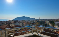 Spacious apartment with an area of 120 m2 in Cikcilli area, Alanya, on the seventh floor of the house-id-3275-photo-1
