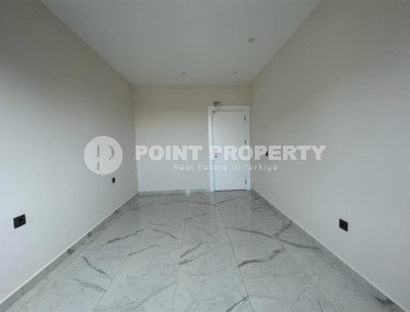 Квартира 2+1 с чистовым ремонтом в недавно построенном доме в центре Аланьи-id-3280-фото-4